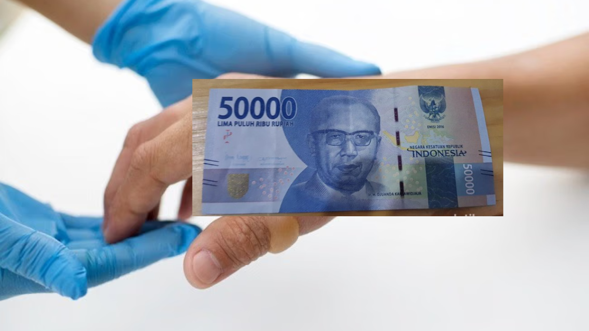gambar uang 50 k dan tangan yang melepuh