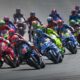 kalender balap Motogp telah rilis, Sekelompok pembalap MotoGP bersaing ketat saat melintasi tikungan di sirkuit