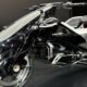 Motor Honda raih penghargaan dan puka dunia, Sepeda motor konsep listrik futuristik berwarna perak dan hitam dengan logo Honda dipajang di pameran