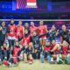 Timnas Voli Indonesia gasak Australia, Tim bola voli putri Indonesia berpose bersama di lapangan indoor dengan latar belakang bendera Merah Putih