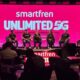 Jaringan 5G XLSMART Resmi Perluas Layanan Unlimited Terbaik di Bali 57 beberapa orang narasumber duduk di atas panggung dengan latar layar merah yang menampilkan tulisan jaringan internet Smartfren Unlimited 5G