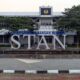 Gedung utama Politeknik Keuangan Negara STAN dengan tulisan besar STAN di depan halaman
