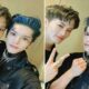 Mark dan Taeyong NCT berpose bersama mengenakan pakaian serba hitam dengan riasan luka di wajah