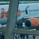 63fabc17e89b3 pesawat lion air di bandara el tari kupang batal terbang gara gara pintu darurat dibuka penumpang minggu 2622023 1265 711 1